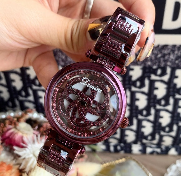Foreign trade hot style watch female steel watch lady quartz watch to turn the windmill surface douyin the same Dujana147